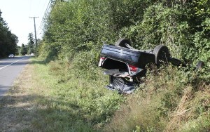 A car rolled on Vashon Highway near S.W. 140th Street after its driver swerved to avoid a deer early Friday morning.