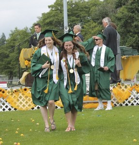 Yarden Blausapp and Kaia Boonzaier leave the stage together and celebrate being VHS graduates.