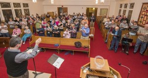 Gary Cannon rehearses the Vashon Island Chorale