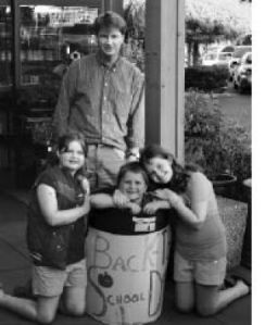 One of the Hennessey family’s many pursuits is organizing a back-to-school drive at the end of the summer