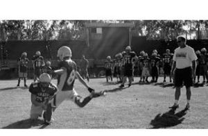Nick Fox Edele kicks a place kick in practice last week as Coach Clay Eastly