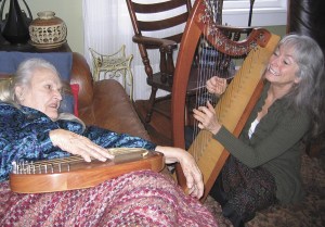 Cynthia Golfus plays harp for a terminally ill woman on Vashon.