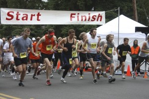 Runners take off at the start of the 10K portion of the Bill Burby Inspirational Run/Walk. Willie Richardson