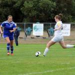 Mike Riggs Photo                                Grace Riggs, in white, beats a Bellevue Christian opponent to the ball earlier this year.