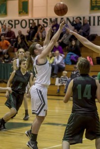 John Sage / FinchHaven PhotoVHS senior Kate Atwell puts up a shot against Peninsula High School at the team’s season opener Tuesday