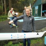 Colby Atwood Photo: Mia Croonquist christens the new eight-person rowing shell named after her.