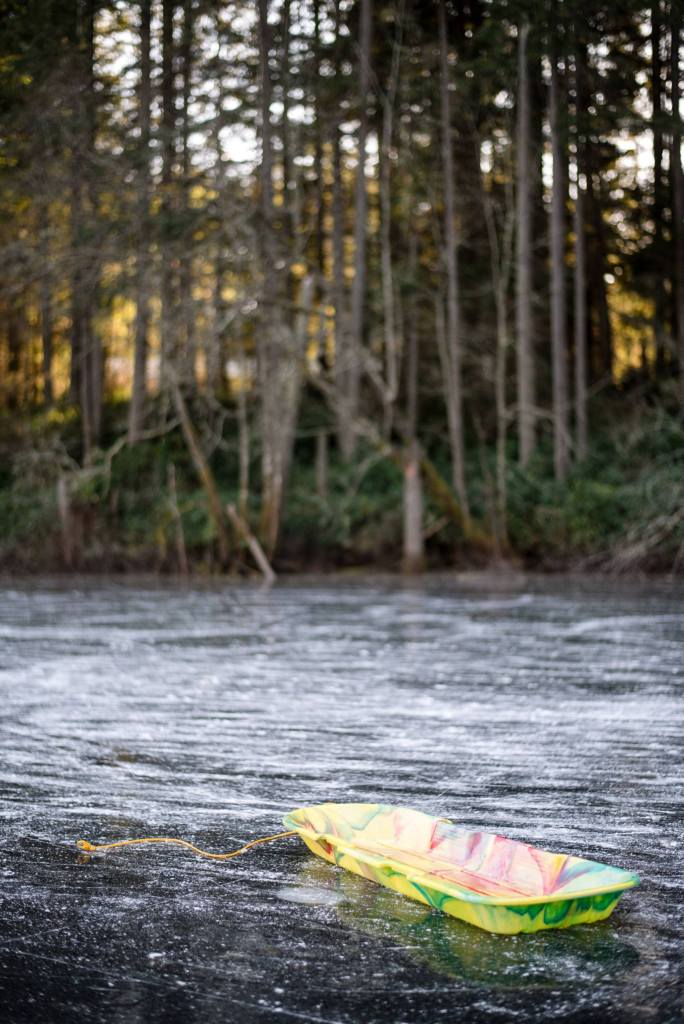 A sled rests on the pond. (Cassie Bergman Photo)