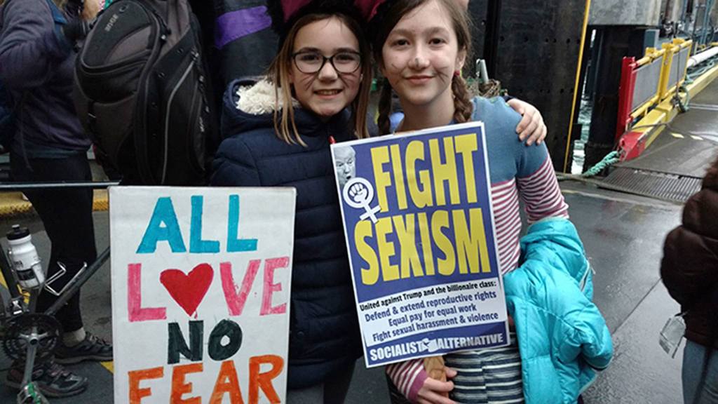 11-year-old Chautauqua students Chloe and Phoebe head home after marching for equal rights for everyone. (Susan Riemer/Staff Photo)