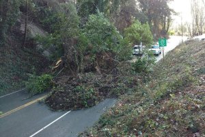 Landslides close 103rd near ferry dock, Quartermaster Road