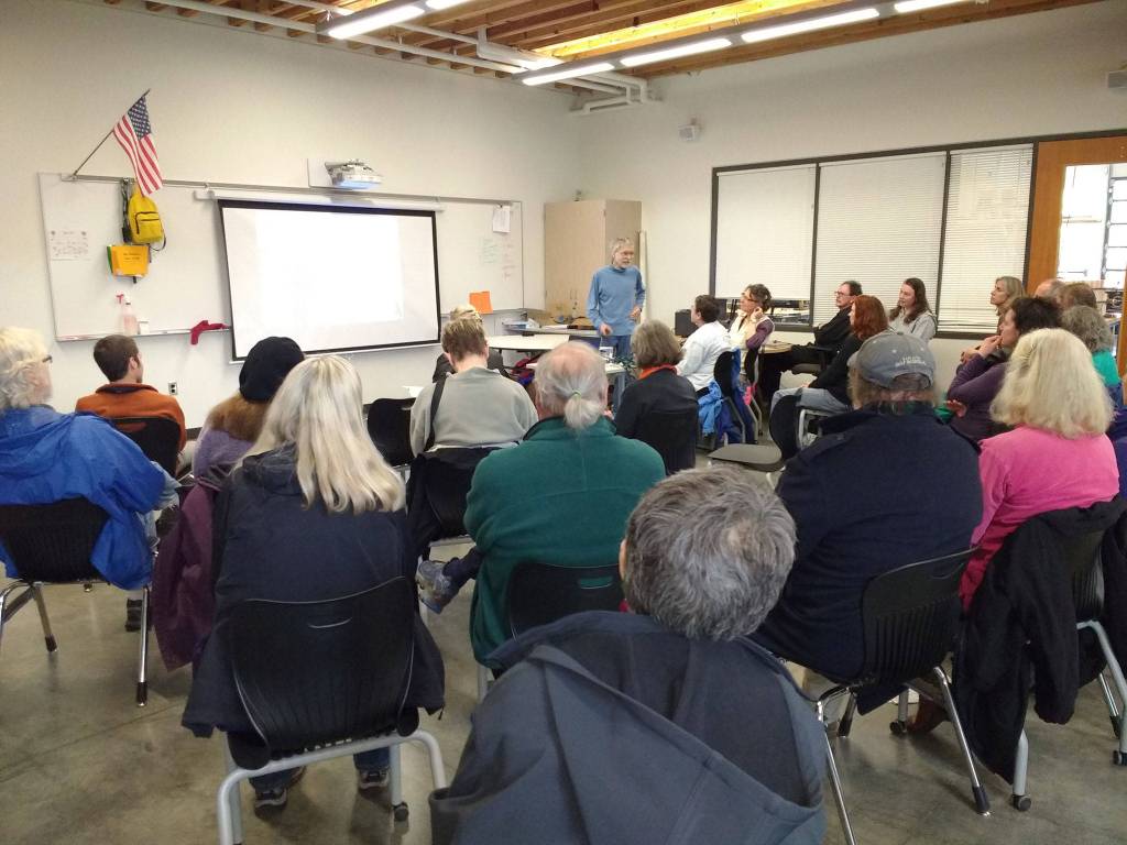 University of Washington Department of Atmospheric Sciences Emeritus Professor Steve Warren was one of the speakers at the event and regaled attendees with stories from his ventures to Antarctica on missions to research ice and how the environment affects its color. (Kevin Jones Photo)