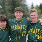 Vashon High School&rsquo;s varsity baseball team seniors Bryce Beaty (middle) and Ashton Dulfer (right) stand with baseball team manager Henry Perlman (left). (Jill Yates Photo)