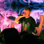 Musical artist Manatee Commune looks out at the audience of high school students Friday morning. (Anneli Fogt/Staff Photo)