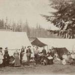 Visitors stand outside their tents during a Chautauqua event at Ellisport in the late 1800s. (Courtesy Photo)