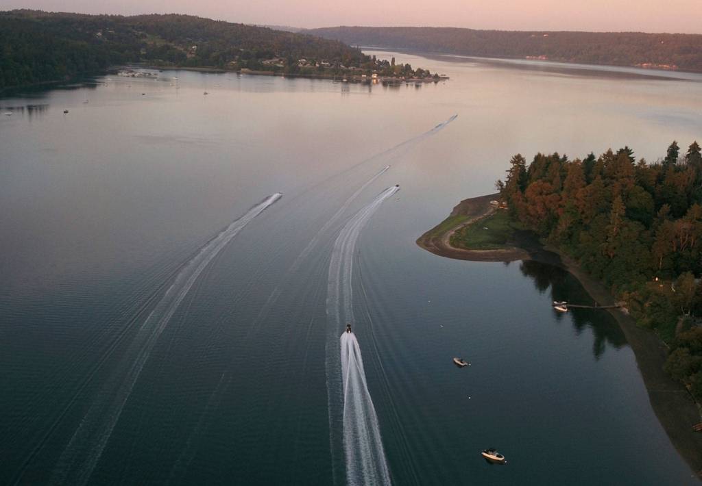 Hydroplanes race out of Quartermaster Harbor early in the morning July 4. (Chris Heider Photo)