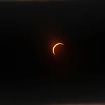 At the height of obscuration on Monday the sun became a small crescent in the sky. (Anneli Fogt/Staff Photo)