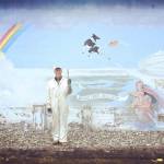 Nearly 40 years after painting original, artist comes back to iconic mural