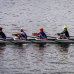 Tor Ormseth, stroke, Brian DeLoach, Malio Nelson and Aidan Teachout row the junior boys&rsquo; quad at the Tail of the Lake Regatta Sunday. (Steve Tosterud Photo)