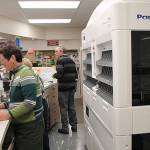 The new machine at the pharmacy is already making a difference, according to owner Tyler Young. (Susan Riemer Staff Photo)