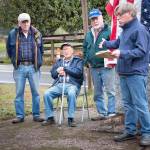 Brian Brenno (far right) introduces Gene Sherman (seated) flanked by his sons Tom Sherman (far left) and John Sherman (second from right). (Terry Donnelly Photo)