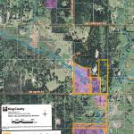 A map showing some of the Vashon-Maury Island Land Trusts recent acquisitions in the Judd Creek Preserve. The Kneeshaw property is outlined in orange but not filled in with purple. (Courtesy Photo)