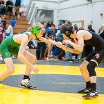 Vashons Ethan McIntyre, left, wrestles a Mount Baker opponent in the 106-pound weight class for a third-place finish at the recent tournament. (Sarah Bunch Photo)