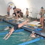 The Vashon Pool enables swimmers to practice on starting blocks. The Seals Swim Team members got some time with them on Monday in their first practice back under the dome. (Susan Riemer/Staff Photo)