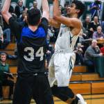 Noah Edmonds goes up for a shot against Bellevue Christian on Friday night. (Julian White-Davis Photo)