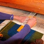 Suzanne Hubbard hand-weaves her tree tapestry (Juli Goetz Morser Photo)