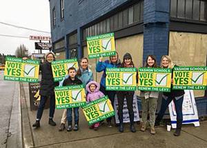 A group of islanders shows their support for the levy before the recent election. (Rheagan Sparks photo)
