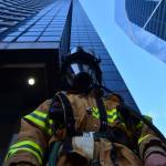 Andy Johnson stands at the base of the Columbia Tower before hitting the stairs (Jim Westcott Photo)