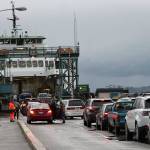 Loading the ferries at the Fauntleroy dock in less problematic during the off-peak travel months, but grows more challenging as the number of vehicles increases. An upcoming study conducted by the University of Washington may lead to new conclusions and practices there. (File photo)