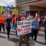 Demonstrating islanders make their up the main highway as part of the March for Our Lives event on Saturday. (Kent Phelan Photo)
