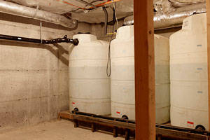 Storage tanks for rain-water reclamation system. (Alex Hayden Photo)