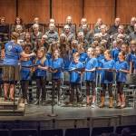 Adults and kids making music together