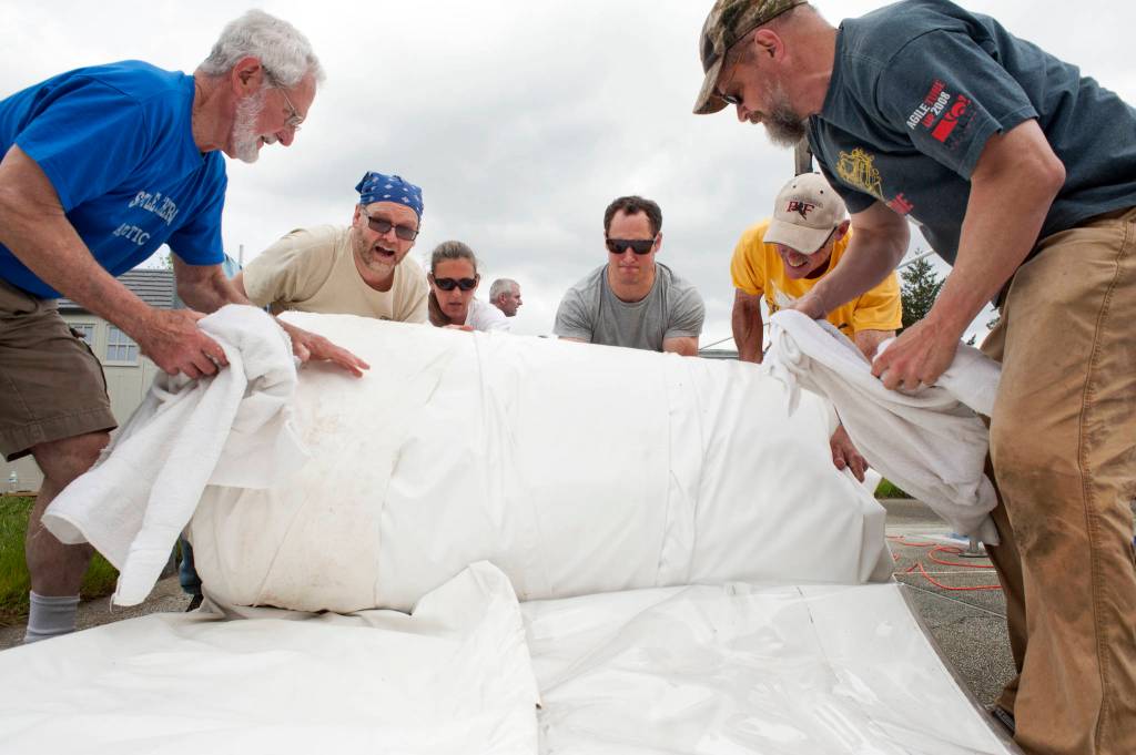 The cover had to be well folded to be shipped to California to fix a manufacturing defect  a big job. (Brian Lee Photo)