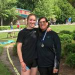 Riley Lynch, left, after presenting her mother, Bonnie Linnell, with the final Regionals medal of her junior rowing career. (Courtesy Photo)