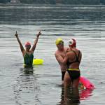 Heidi Skrzypek (left), Curtis Vredenburg (center) and Kate Curtis prepare for a swim last week in Vashons Paradise Cove. They are part of a four-person relay team that will cross the English Channel to benefit the People For Puget Sound program. (Paul Rowley/Staff Photo)