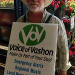 Rick Wallace, taking a break from selling Voice of Vashon raffle tickets at Thriftway last week, is well known for his volunteer efforts (Courtesy Photo).