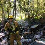 Firefighters work to put out Saturdays Spring Beach fire (Brigitte Schran Brown Photo).