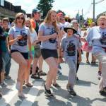 Libbie Anthony (second from right) marched in the Strawberry Festival parade in 2012 with the cast of Drama Docks production of The Pirates of Penzance  the last show of many that Anthony directed for the community theater group (Courtesy Photo).