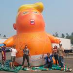 Members of the Backbone Campaign pose with the Trump Baby balloon after Washington residents independently fundraised to have one brought to the state and loaned it to the organization (Courtesy Photo).