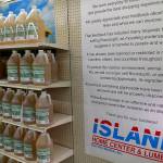 Island Home Center & Lumber posted a large notice about its decision regarding Roundup last week. Next to the notice is agricultural vinegar, which the stores Garden Center Manager Tanner Yelken says is an effective alternative. (Susan Riemer/Staff Photo)