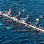 Vashons junior mens quad warms up before its race and fourth-place finish at the prestigious Head of the Charles Regatta. From stern to bow: Tor Ormseth, Rohin Petram, Bowie Hichens, Oz Hichens and coxswain Aidan Teachout. (Jordan Petram Photo)