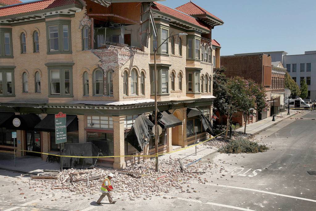 (Rick Loomis/Los Angeles Times/TNS)                                Damage in downtown Napa after a magnitude 6 earthquake struck the area in August 2014.