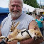 Lysen with a canine friend at Strawberry Festival in 2014. (Pete Welch Photo)