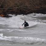 Winter storm brings breakers, and surfers, to the north end