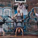 The cast of Fail Better: Beckett Moves UMO, performs the show on a giant see-saw and aerial ropes (Courtesy Photo).