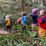 Children at Huckleberry Kids spend their days outside in the woods. (Courtesy Photo)
