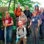 Washington Trail Association volunteers were joined by King County Department of Natural Resources and Parks Director Christie True, second from left, and King County Parks staff person Joe Van Hollebeke, on the far left, on a day last June in Maury Island Marine Park (David Kimmett Photo).