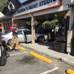 The scene of a minor car accident Saturday morning in the Thriftway parking lot is roped off as aid crews evaluate the driver (John Simonds Photo).